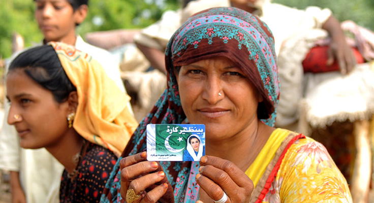 a rural woman holding a benazir card